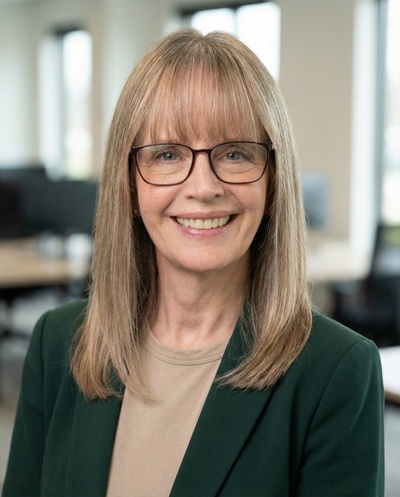 Professional AI headshot example created by HeadshotPro - female business portrait