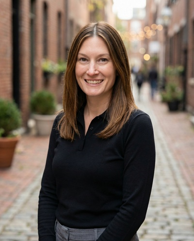 Professional AI headshot example created by HeadshotPro - female business portrait