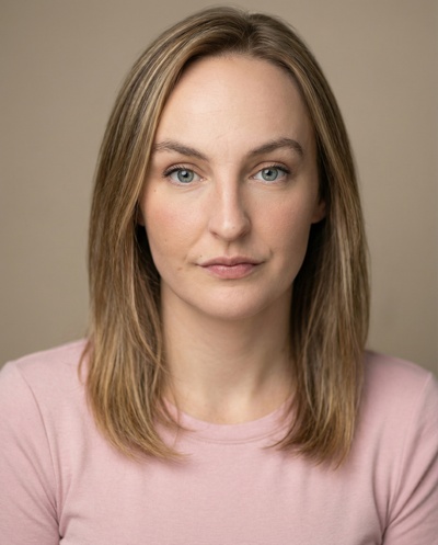 Professional AI headshot example created by HeadshotPro - female business portrait