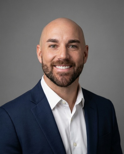 Professional AI headshot example created by HeadshotPro - male business portrait