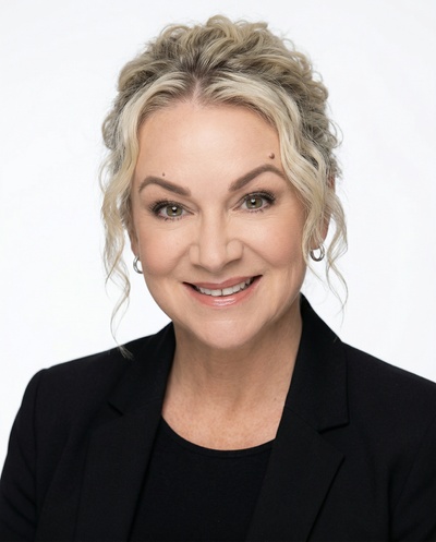 Professional AI headshot example created by HeadshotPro - female business portrait