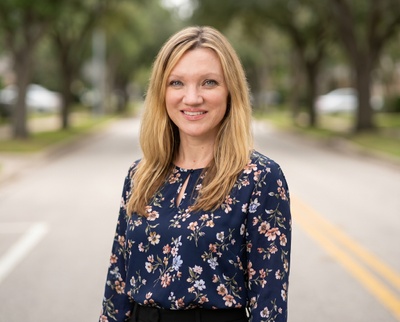 Professional AI headshot example created by HeadshotPro - female business portrait