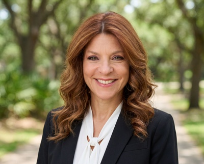 Professional AI headshot example created by HeadshotPro - female business portrait