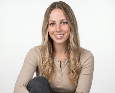 Professional AI headshot example created by HeadshotPro - female business portrait