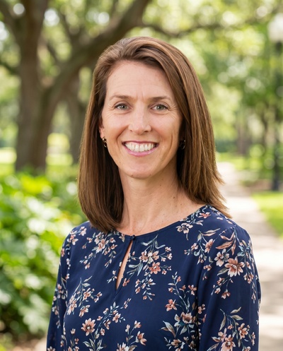 Professional AI headshot example created by HeadshotPro - female business portrait