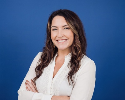 Professional AI headshot example created by HeadshotPro - female business portrait