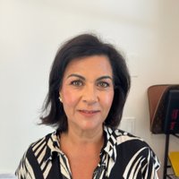 Selfie of a woman uploaded to HeadshotPro AI headshot generator