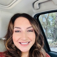 Selfie of a woman uploaded to HeadshotPro AI headshot generator