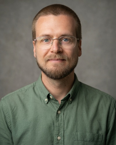 Professional AI headshot example created by HeadshotPro - male business portrait