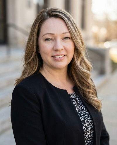 Professional AI headshot example created by HeadshotPro - female business portrait